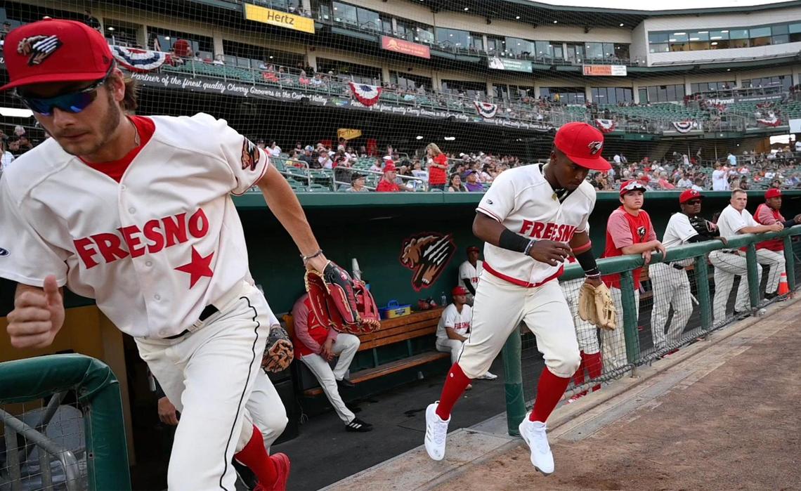 The Fresno Grizzlies take the field for the season opener against the Stockton Ports Friday, April 8, 2022 at Chukchansi Park in Fresno.