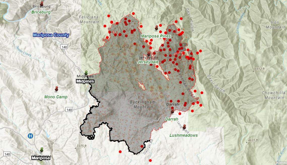 The Oak Fire burning in Mariposa County is estimated at 18,715 acres and 32% contained as of Wednesday morning, July 27m, 2022. The fire started on July 22 near the community of Midpines. The black line to the southwest indicates where firefighters have contained the wildfire. Red dots mark hot spots detected by satellites where the fire continues to grow to the north and east..