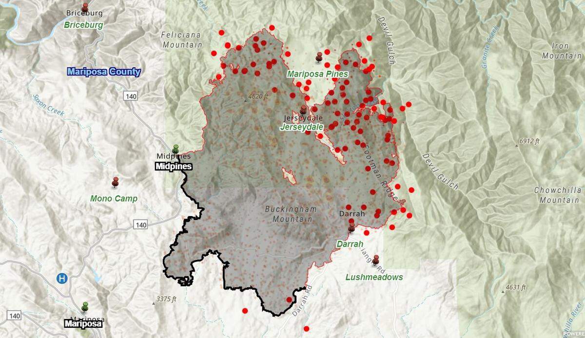 The Oak Fire burning in Mariposa County is estimated at 18,715 acres and 32% contained as of Wednesday morning, July 27m, 2022. The fire started on July 22 near the community of Midpines. The black line to the southwest indicates where firefighters have contained the wildfire. Red dots mark hot spots detected by satellites where the fire continues to grow to the north and east..