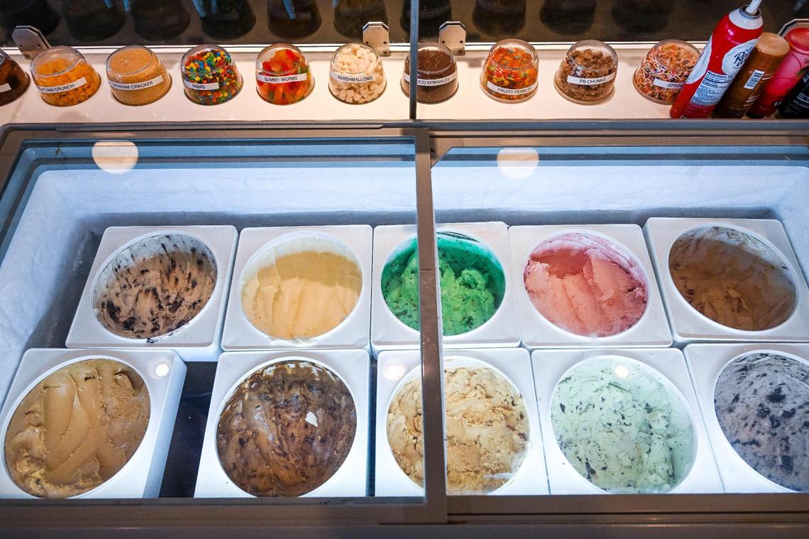 A variety of ice cream flavors and toppings await customers the CREAM ice cream franchise Gurvinder Sandhu and Amanda Vogel recently purchased and are running with their kids.