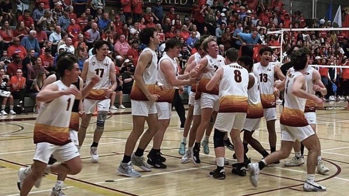 Clovis West celebrates after defeating Buchanan for the Central Section Division I boys volleyball championship on Thursday, May 12, 2022.