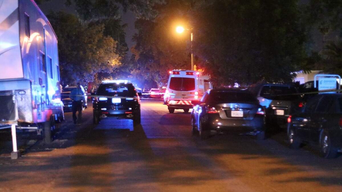 Police investigating a scene where a step-father allegedly shot and killed his step-son on Thursday, May 2, 2019.