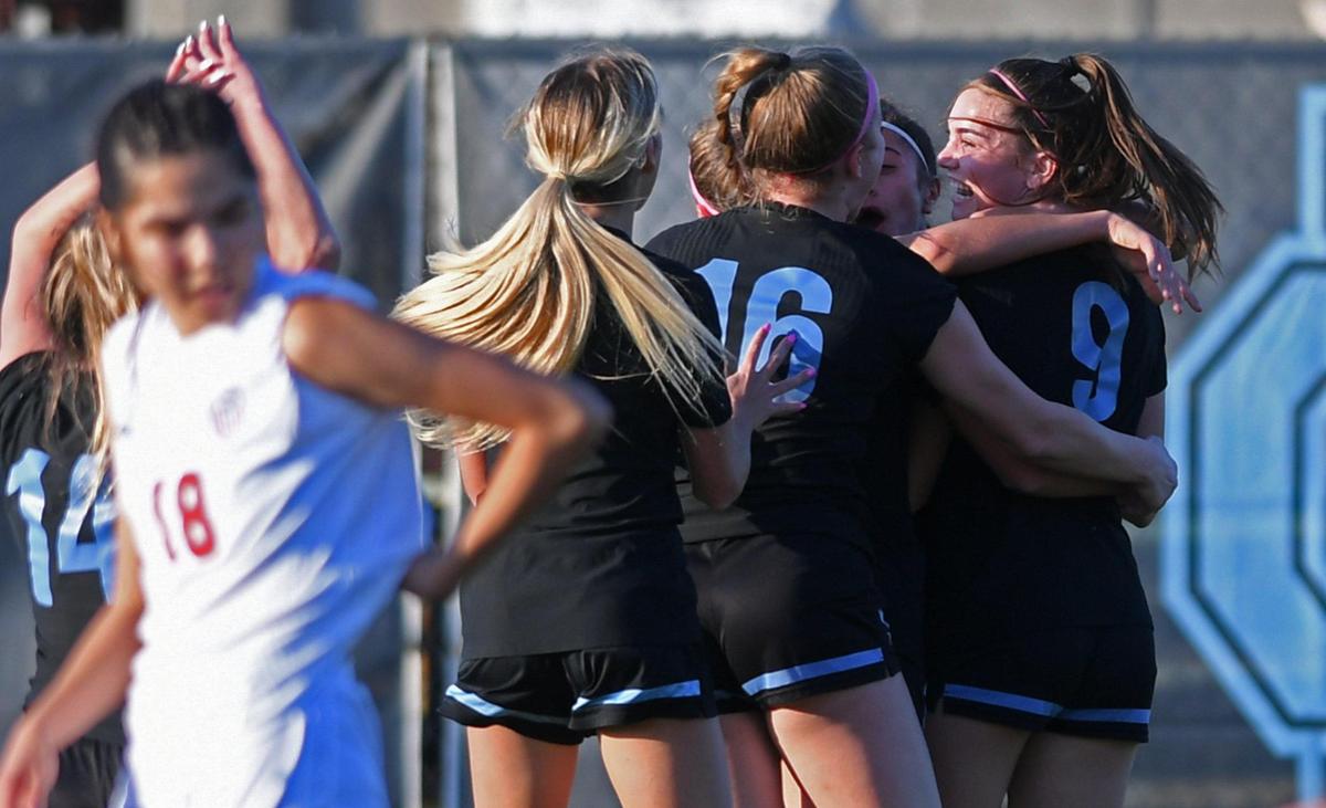 Clovis North’s Hannah Peters, right, is hugged after she scored the goal against Buchanan in a Tri-River Athletic Conference matchup Thursday, Feb. 9, 2023 in Fresno. Clovis North won 1-0.
