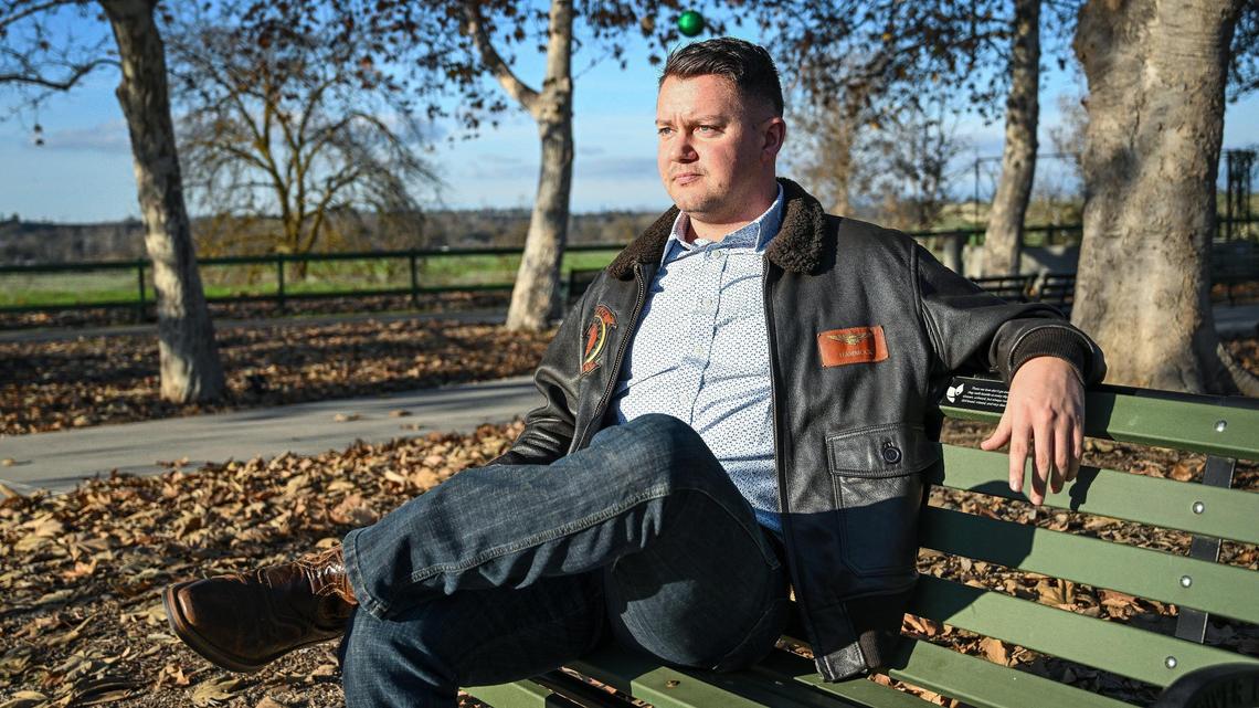 Nick Richardson, siting in the Art of Life Healing Garden in Woodward Park on Tuesday, Dec. 31, 2024, is the newly elected Fresno city council member who will represent northeast Fresno’s District 6 starting Jan. 7, 2025. The 33-year-old Marine Corps reservist plans to walk roughly 13 miles to City Hall to take his oath of office.