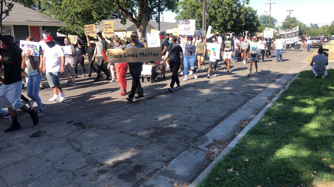 At least 500 people marched in southwest Fresno from St. Rest Church on East Rev. Chester Riggins Avenue to the Cecil C. Hinton Center on South Fairview Avenue on Saturday, June 6, 2020.