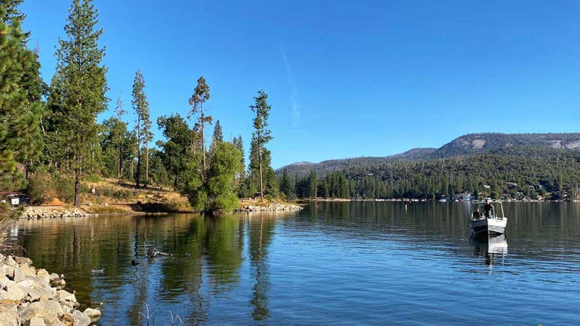 The Madera County Sheriff’s Office posted this picture on its Facebook page of deputies on the scene with CHP and CALFIRE for a submerged vehicle in Bass Lake on Wednesday.