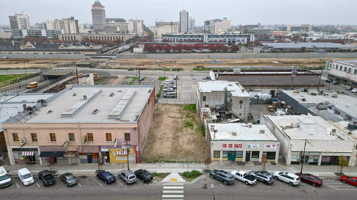 An empty lot is all that is left where the Bow on Tong building stood until a fire destroyed it in 2022. Vacant buildings have been a concern for residents due to their occupation by the unhoused and ensuing fire dangers.