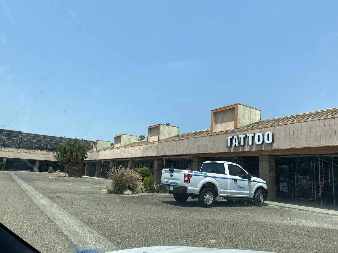 Fresno City code enforcement checking with the few local business owners on N. Blackstone and E Griffith Way.