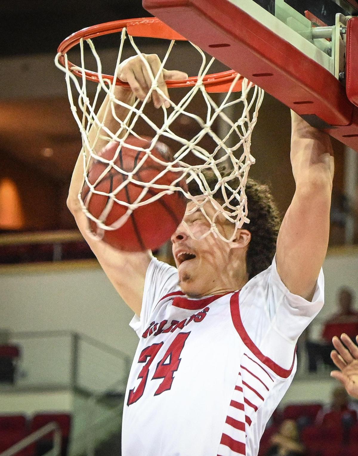 Fresno State’s Braxton Meah dunks the ball on a lob against Youngstown during their quarterfinal game in the 2022 Basketball Classic tournament at the Save Mart Center in Fresno on Wednesday, March 23, 2022.