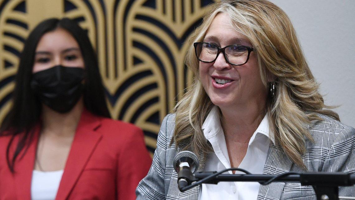 Dr. Carole Goldsmith, right, speaks to those gathered after State Center Community College District Board President Annalisa Perea, left, revealed Goldsmith had been chosen as the new chancellor during a press conference Monday, Nov. 29, 2021 in Fresno. Goldsmith is the president of Fresno City College and was appointed with a 6-1 vote.