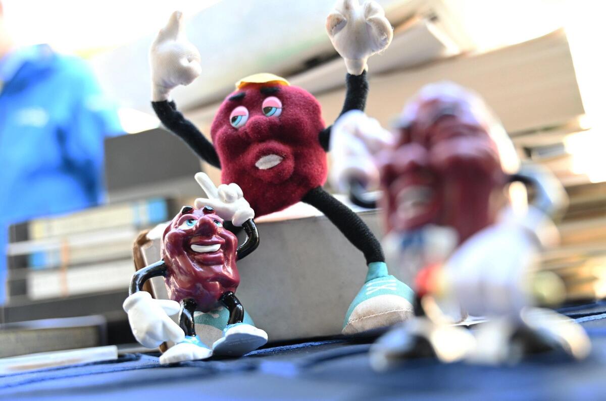 Dancing Raisins figures are seen after being retrieved from a time capsule 30 years after being sealed inside a structural part of City Hall Tuesday, Dec. 13, 2022 in Fresno. A new time capsule will be locked away and retrieved in another 30 years.