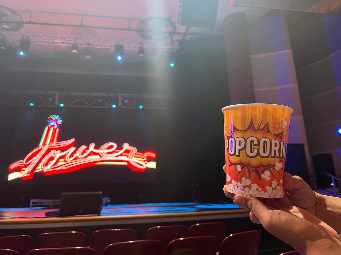 Erik Galicia holding a popcorn bucket at Tower Theatre on Saturday, June 21, 2025