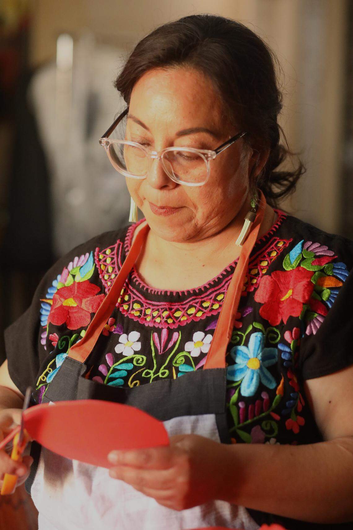 Leticia Valencia has brought La Catrina of Visalia to life for over a decade. She and her husband, Claudio Martínez, create the dresses La Catrina wears each year.