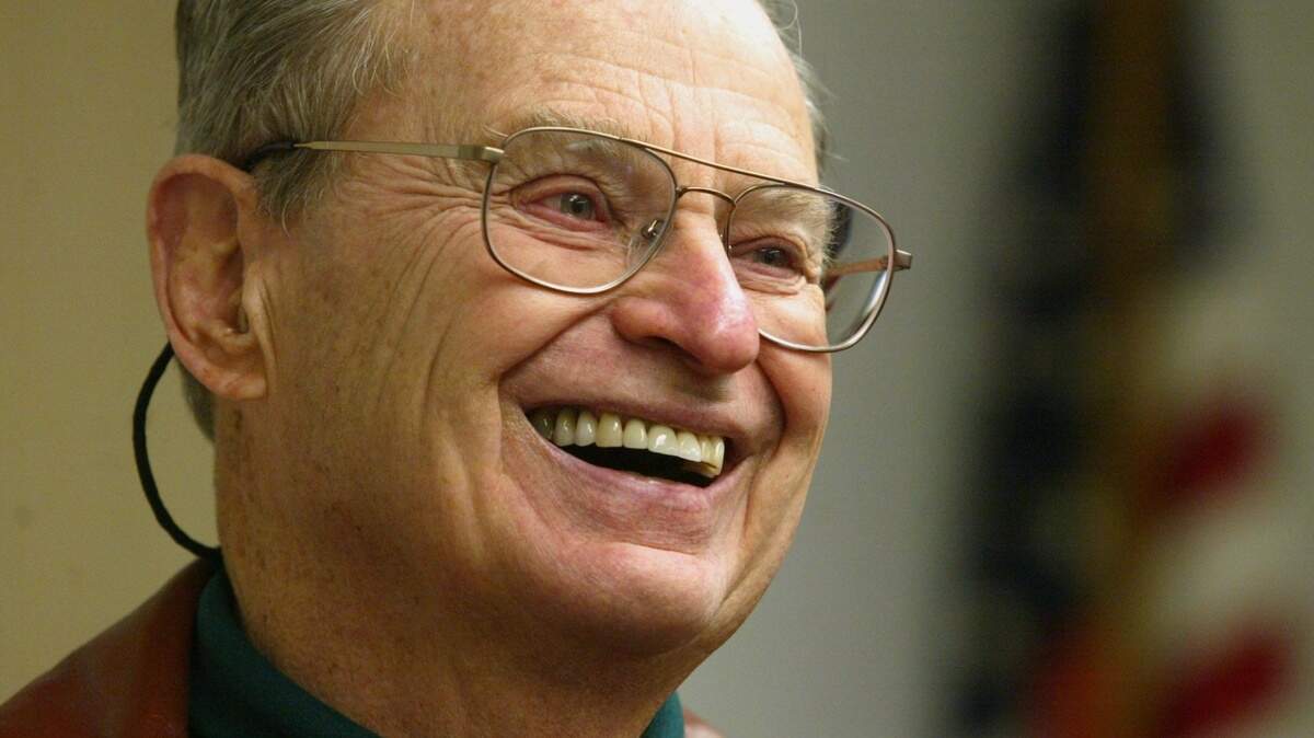 Bud Richter reacts at being named the winner of the 2006 Leon S. Peters award in a December 2005 photo.
