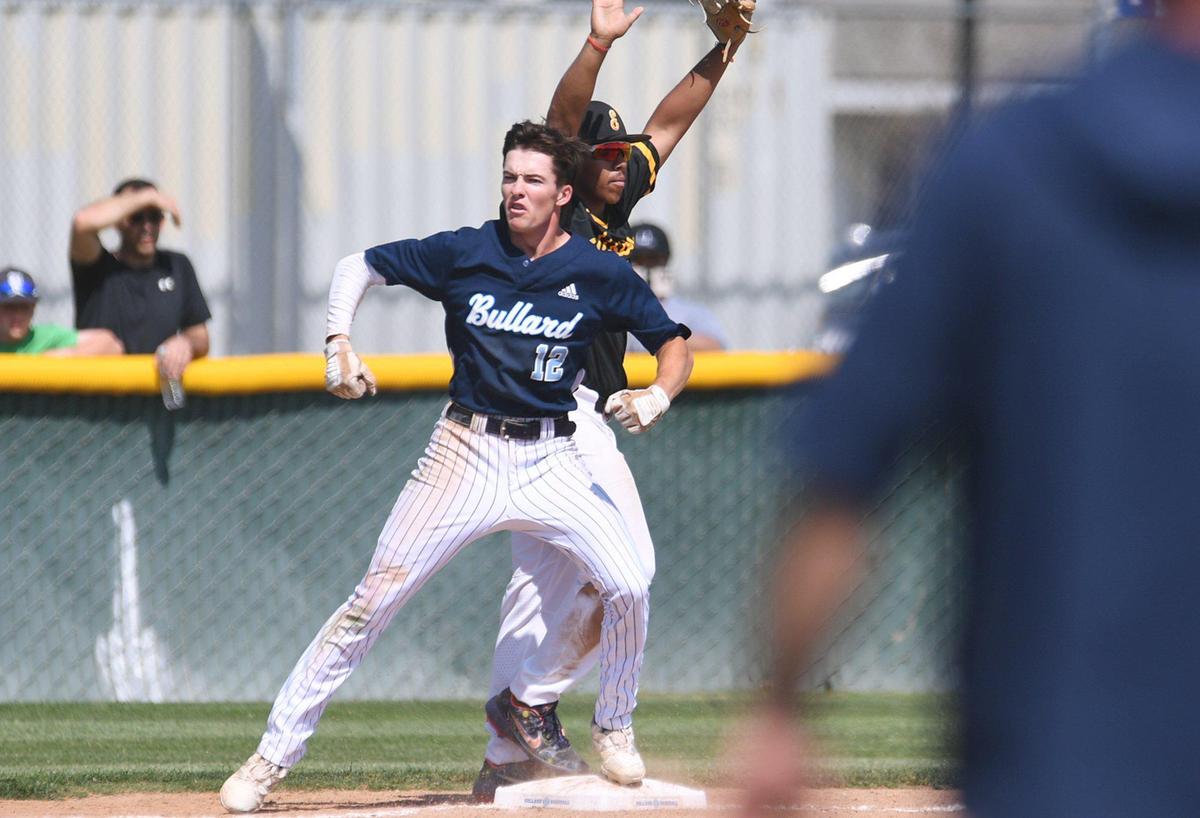 Bullard’s Jaxon Murphy, left, reaches third base in a County/Metro Athletic Conference baseball game against Edison Saturday, March 26, 2022 in Fresno.