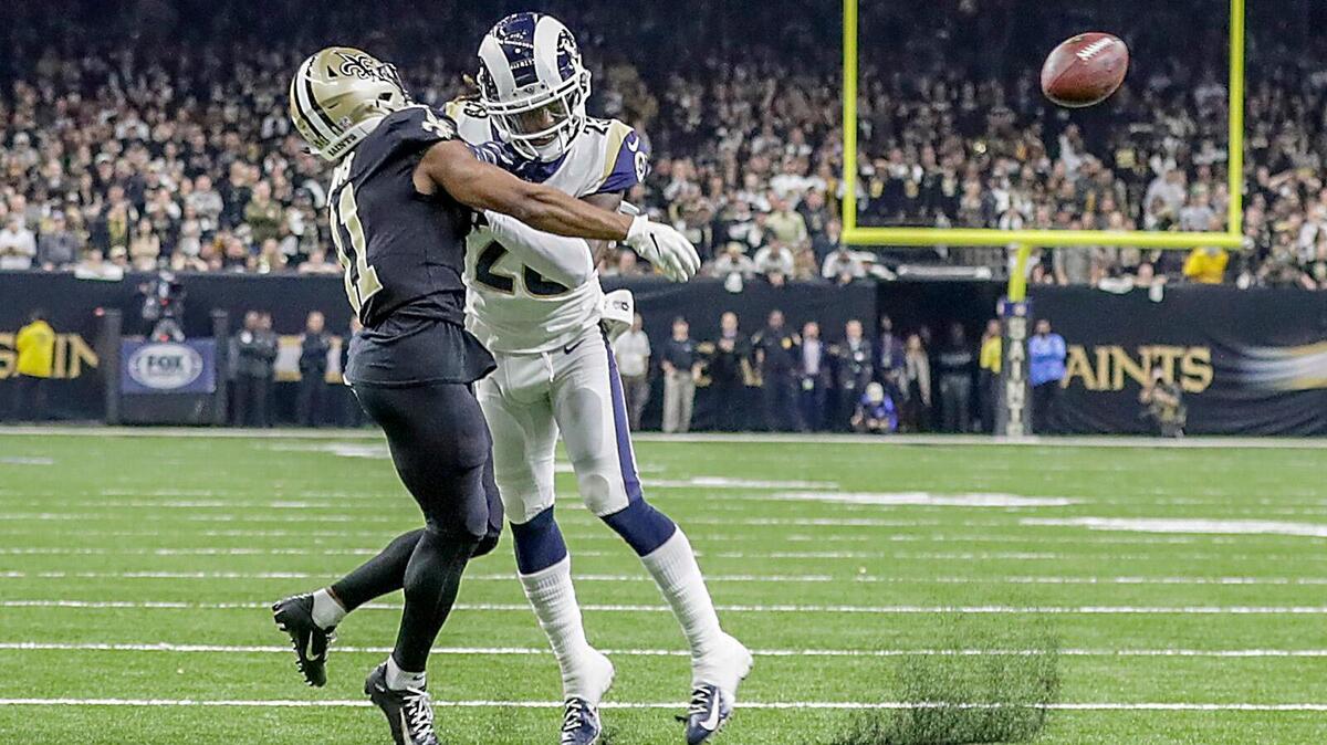 Los Angeles Rams cornerback Nickell Robey-Coleman seems to deliver an early hit to New Orleans Saints receiver Tommylee Lewis late in the fourth quarter, thwarting a potential game-winning drive during the NFC Championship game on Sunday, Jan. 20, 2019 at the Superdome in New Orleans, La. (Robert Gauthier/Los Angeles Times/TNS)