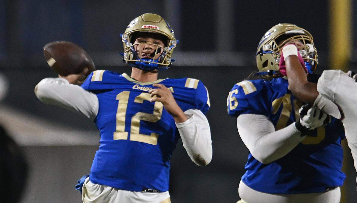 Clovis High quarterback Deagan Rose passes against Clovis West Friday, Nov. 14, 2025 in Clovis. Clovis led 21-7 at halftime.