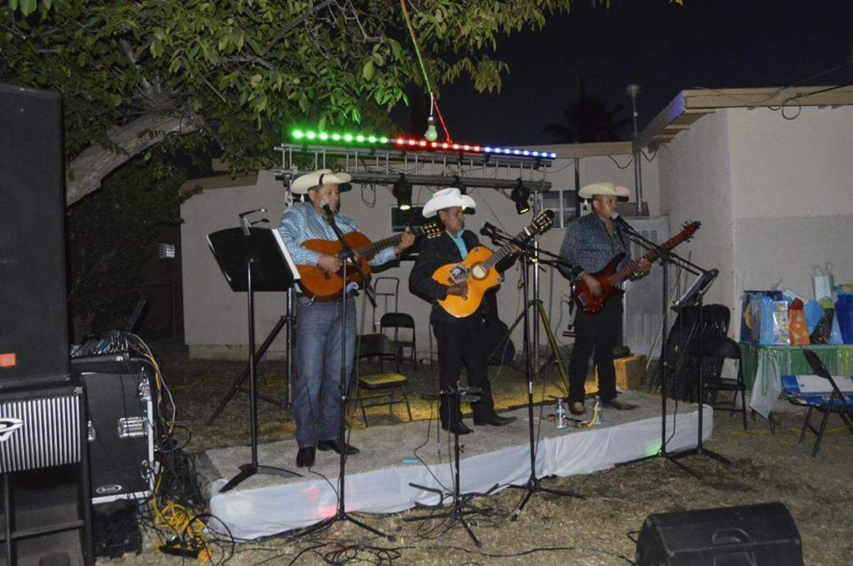 Dueto Intacto de Guerrero, a music group where Felix Gonzalez plays guitar, performs at a party in the central San Joaquin Valley.