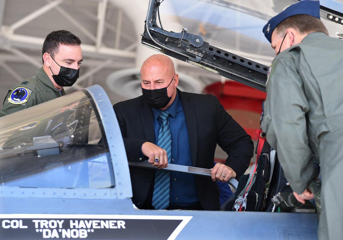 Col. Troy Havener, California Air National Guard, 144th Fighter Wing commander, right, and Capt. Sklar Bautista, left, show Mayor Jerry Dyer, the cockpit of Havener’s F-15 after dedication ceremonies Friday April 16, 2021. The 144th honored the City of Fresno by ceremoniously dedicating the F-15 fighter jet, with nose art seal of the City of Fresno, to the city and its citizens for their support to service members and the wing, as part of its “Cities of Honor” program. This is the Wing’s second dedication to the City of Fresno, which first occurred September 2, 2014. The 144 FW initiated the Cities of Honor program April 18, 2014 during a ceremony that paid tribute to the city of Madera, Calif. Over the next few years, the Wing will continue the Cities of Honor jet-dedication program by dedicating F-15s to local cities within the Central Valley.