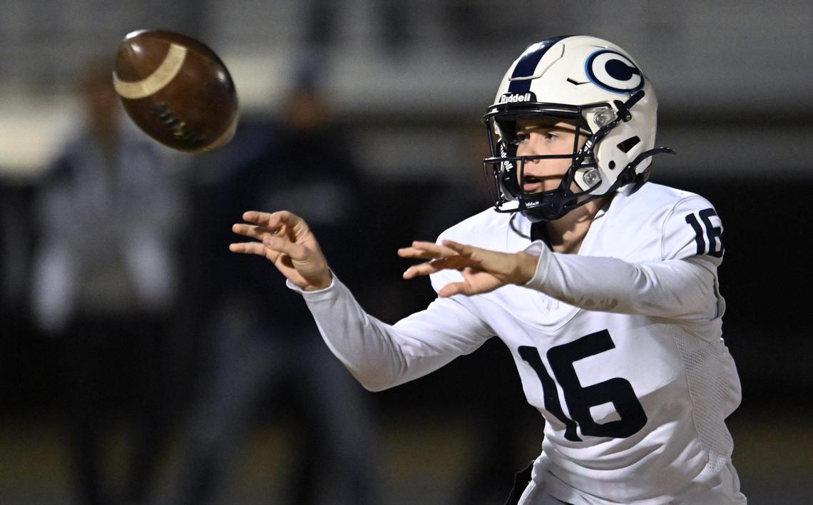 Central Valley Christian quarterback Nathan Peters pitches the ball to running back Josh Hilvers in the D2 semifinal championship game against Golden West Friday night, Nov. 22, 2024 in Visalia. CVC beat Golden West 28-7 and will face Bakersfield in next week’s final.