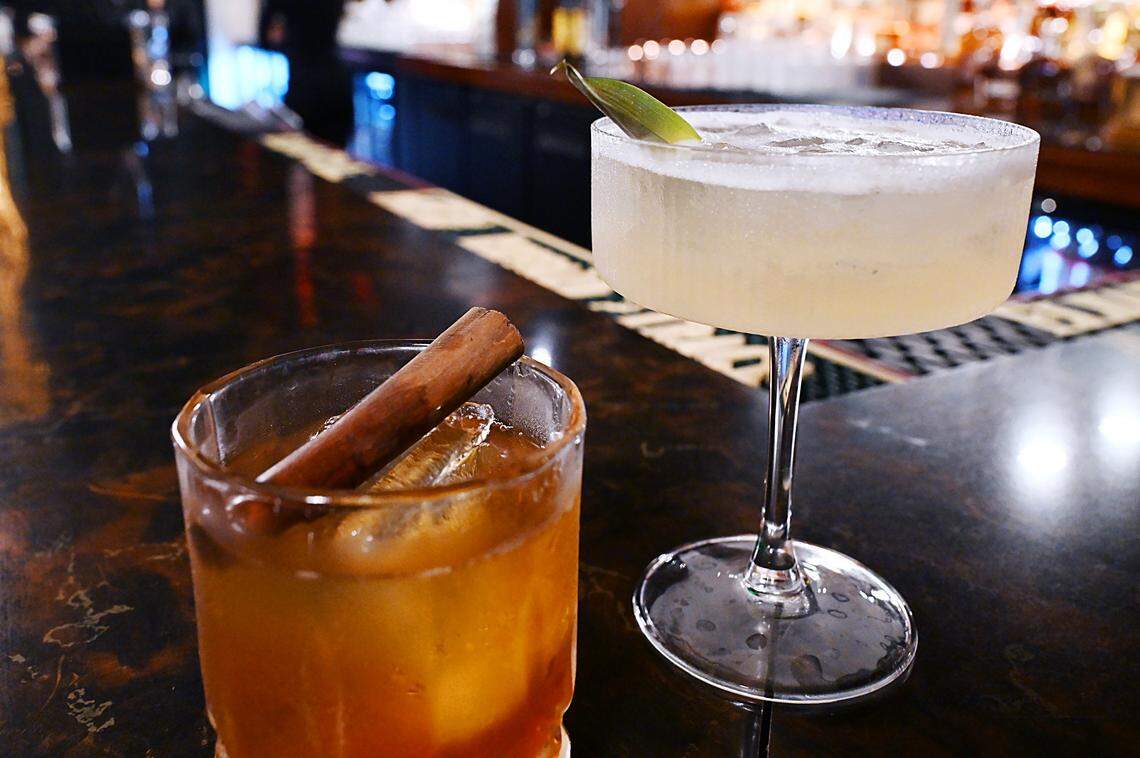 A Churro Old Fashioned, left, with a Sweet Heat using vodka and homemade pineapple syrup and more, are two cocktails served at the new Electric Olive cocktail bar in Fresno's Tower District Thursday, Nov. 20, 2025 in Fresno.