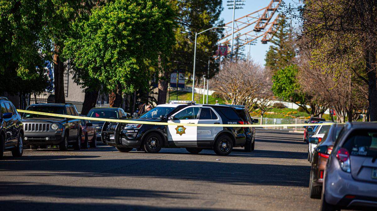 Police tape off street near Bulldog Stadium to investigate drive-by shooting on Friday, March 11, 2022.
