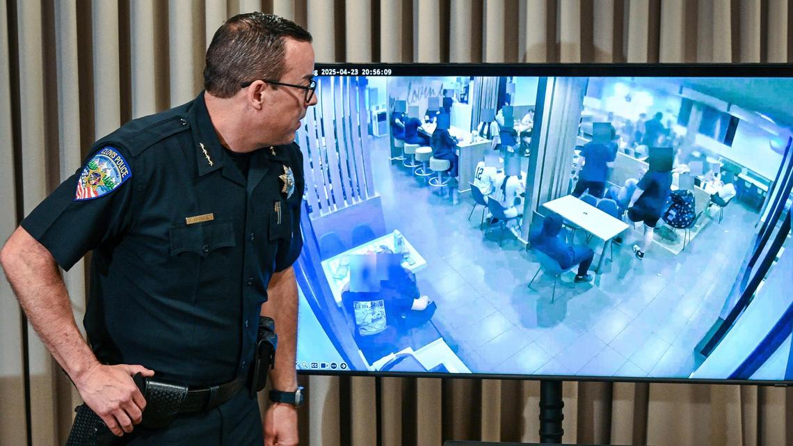 During a news conference on Friday, May 2, 2025, Clovis Police Chief Curt Fleming shows surveillance video inside a McDonald’s restaurant showing the suspect, center, in the shooting death of Caleb Quick, as he sits at a table before following the Quick outside and shooting him in the head.
