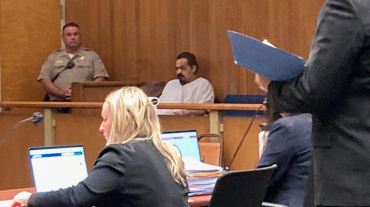 Mass murder suspect :Angel Uriarte, 35, sits in Tulare County court flanked by a bailiff for a hearing Tuesday, June 6, 2023. Co-defendant Noah Beard, 25, not pictured, was also in court Tuesday but placed far apart from Uriarte.