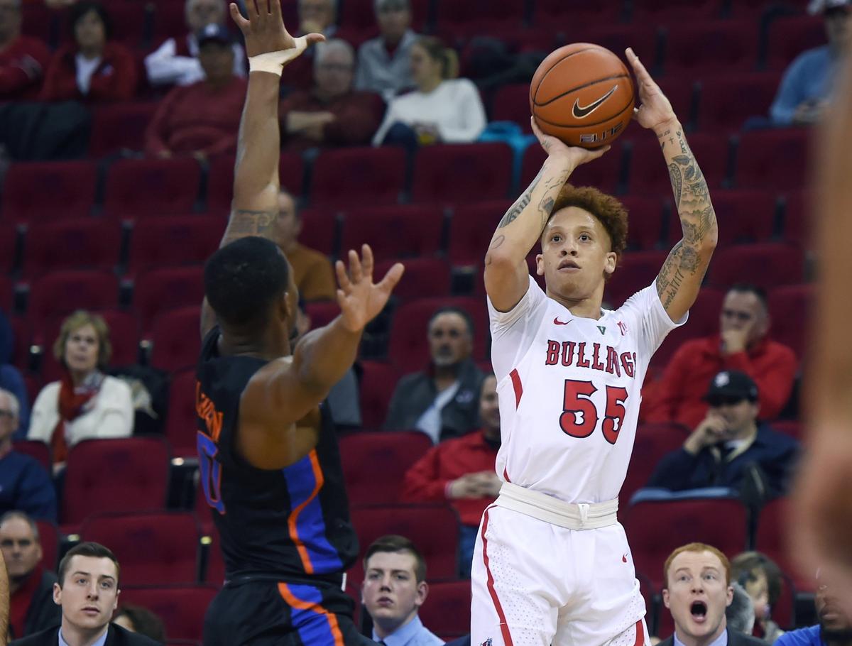 Fresno State guard Noah Blackwell, right, and the Bulldogs were picked to finish sixth in the Mountain West in a preseason poll of media that covers the conference on a regular basis. The Bulldogs last season went 23-9, their fourth 20-win season in a row and the fifth in six years.