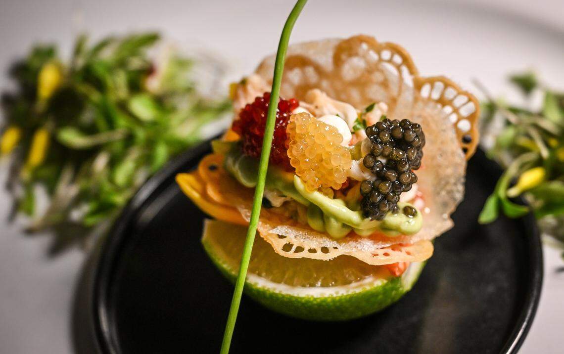A lobster and caviar taco made with crisp rice paper, avocado mousse and creme fraiche is displayed during a media event to promote The PM Lounge, a new members-only  club that promises to bring high-level dining experiences and live entertainment to its guests.