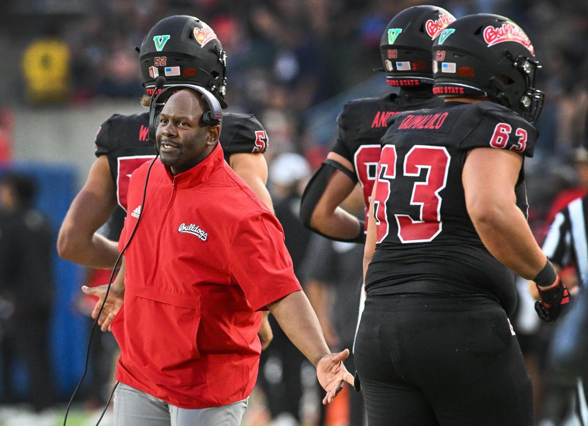 Fresno State interim head football coach Tim Skipper congratulates players after a score against San José State during their game at Valley Children’s Stadium in Fresno on Saturday, Oct. 26, 2024.