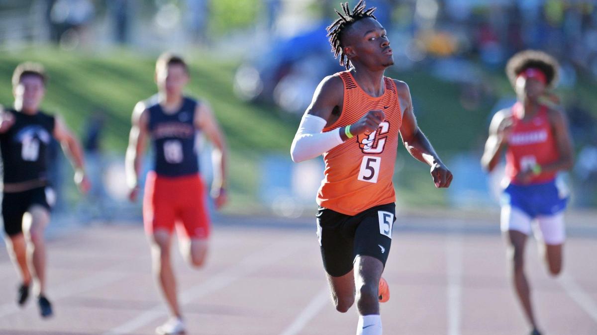 Central’s Jeremiah Walker, second from right, places first in the 400 at the Central Section Masters held at Buchanan High School Saturday, May 21, 2022 in Clovis.