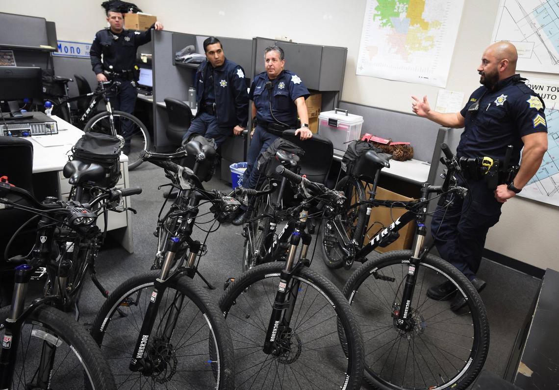 With their bikes at the ready, Sgt. Alfonso Castillo, right, conducts a morning briefing with members of the Downtown Police Unit, Feb. 28, 2019.