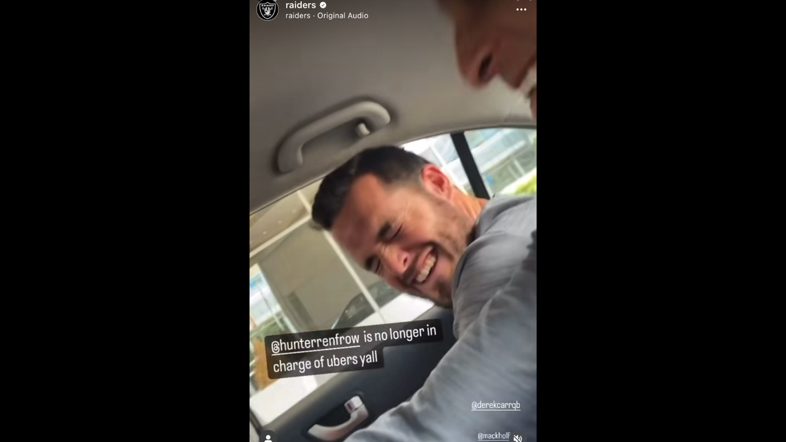 Raiders quarterback Derek Carr laughs while in an Uber with teammates in Canton, Ohio, in an Instagram video shared by teammate Davante Adams and the NFL team.
