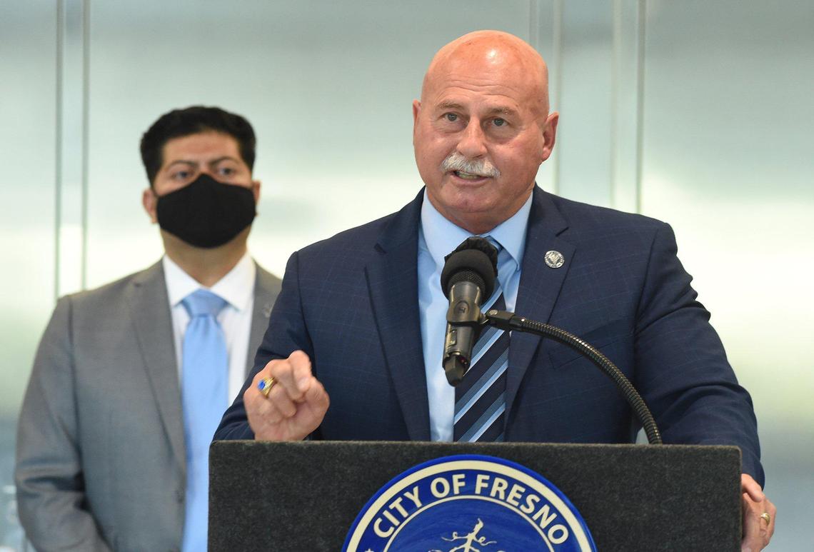 Fresno Mayor Jerry Dyer speaks of the senseless Sunday afternoon shooting death of a street vendor in a quiet Fresno neighborhood, during a press conference, as council member Luis Chavez, looks on, March 22, 2021.