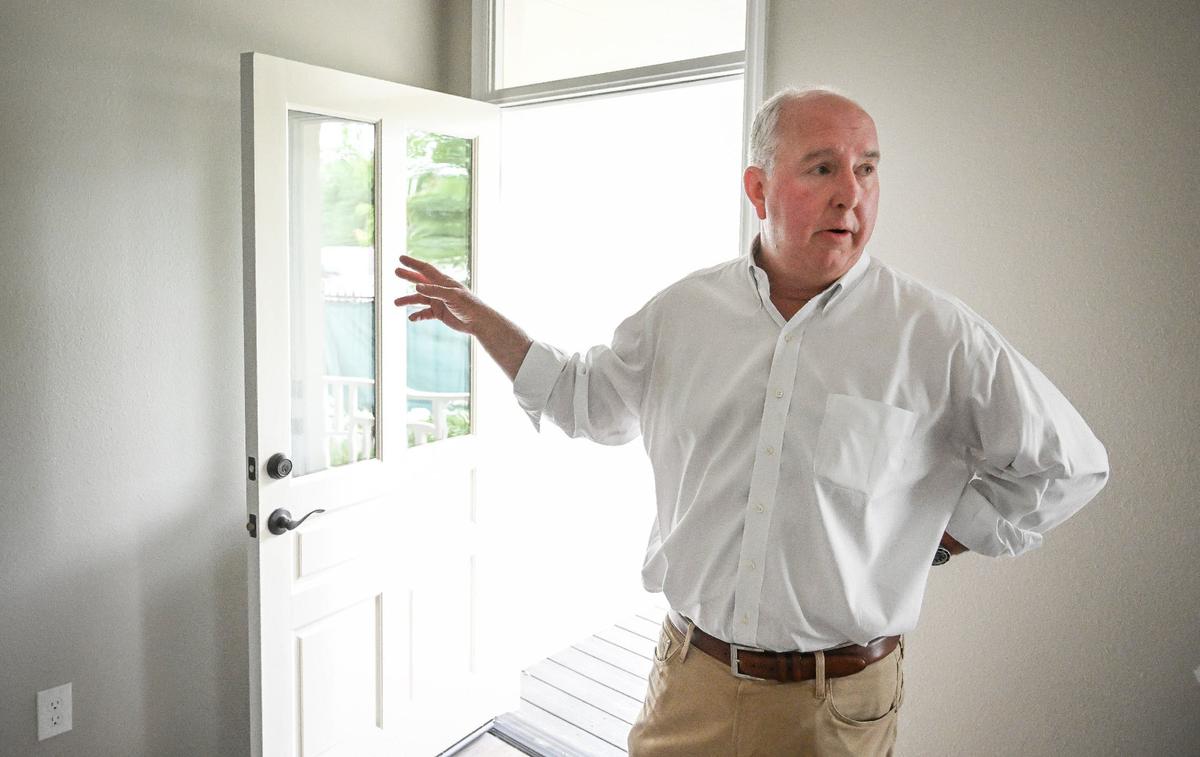 Scott Anderson of the Penstar Group, a commercial real estate firm, talks about how his company got involved in the Armenian home restoration project, while touring one of the renovated homes at M and Santa Clara streets in downtown Fresno’s Armenian Town area on Monday, June 4, 2024.
