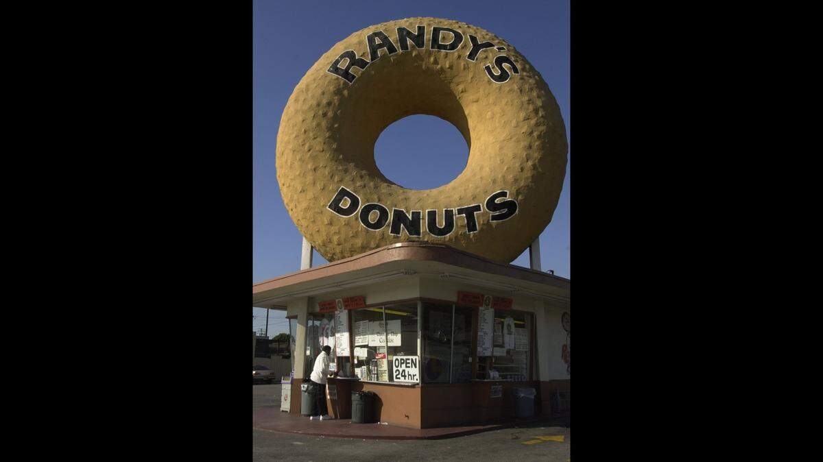 Randy’s Donuts, with its iconic giant donut atop the building, is planning to open several locations in Fresno.