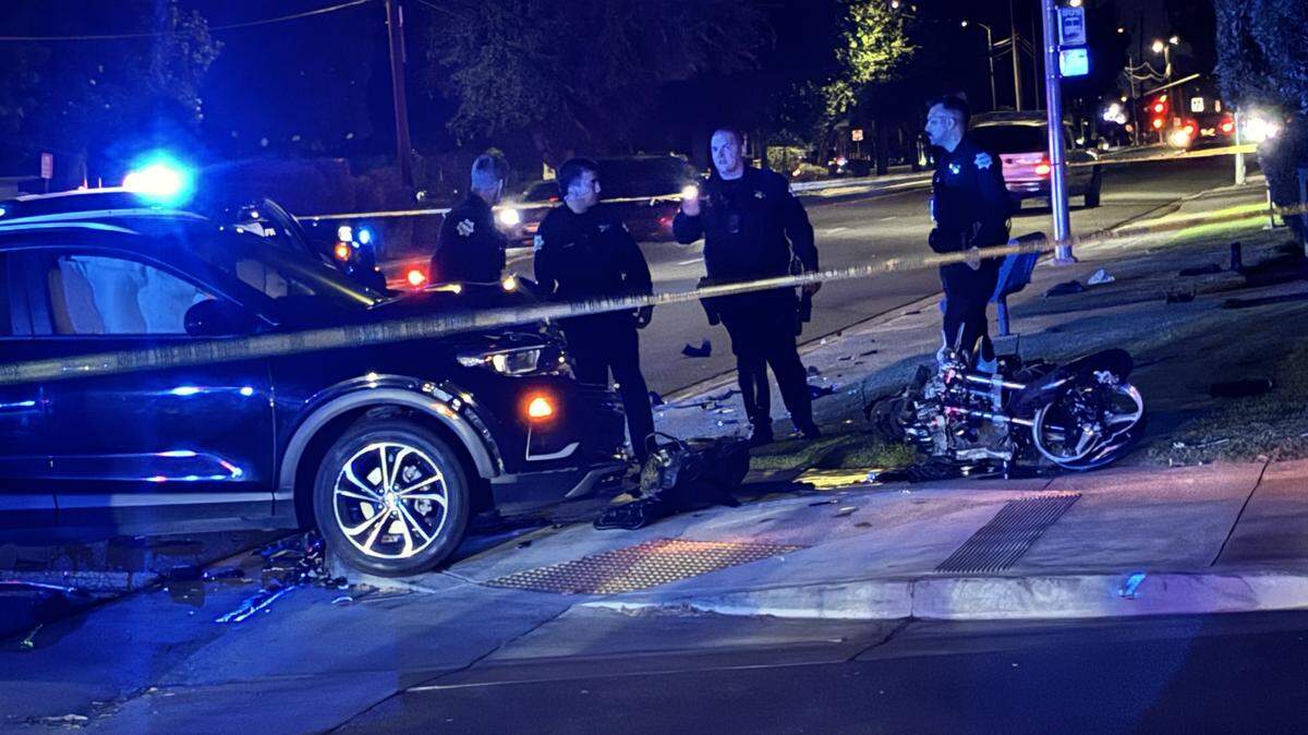 Officers investigate a crash involving a motorcyclist and a suspected DUI driver at Ashlan and Bond avenues on Saturday, May 23, 2026 in Fresno, California.