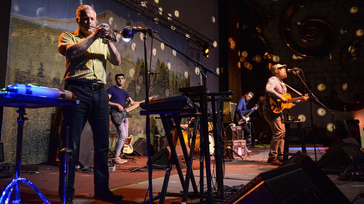 Trumpet player Vince DiFiore, left, plays as vocalist John McCrea, right, sings vocals with the Sacramento band Cake during a benefit concert for the Andrew Janz campaign at the Crest Theater in downtown Fresno on Friday, Nov. 2, 2018.