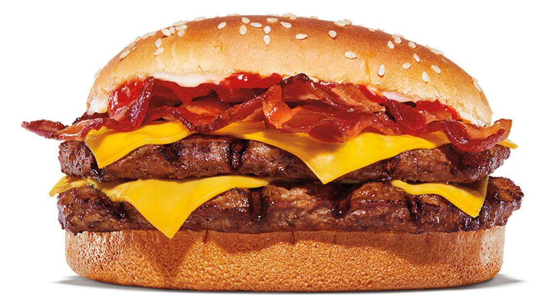 The Bacon King burger at Burger King comes with two quarter-pound beef patties, plenty of bacon, American cheese, ketchup, and creamy mayonnaise on a toasted sesame seed bun.