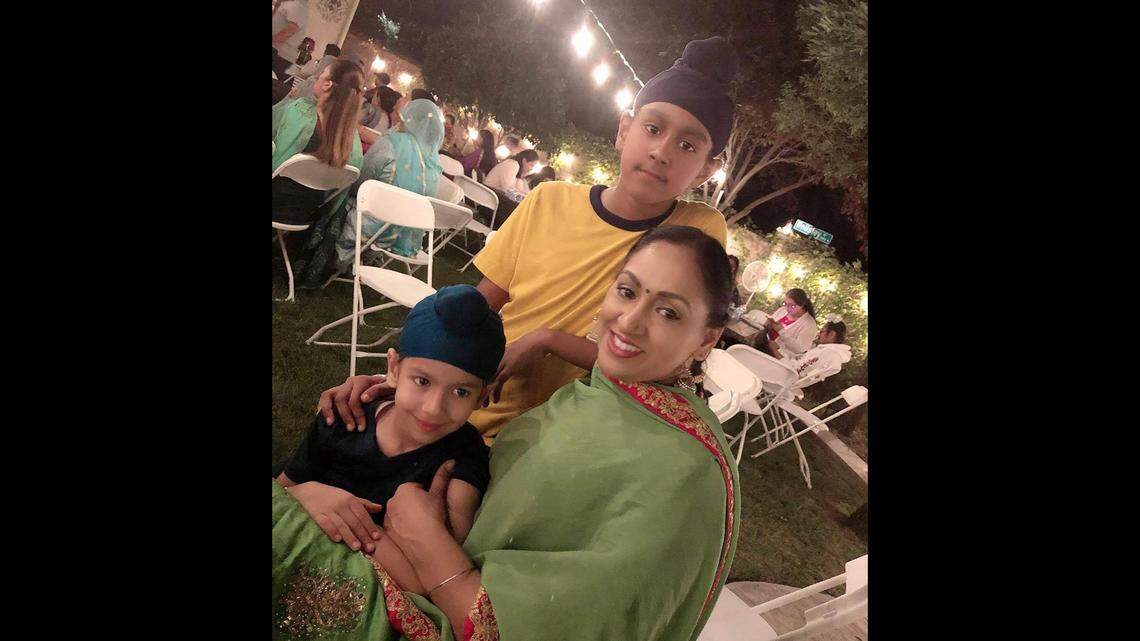 Sukhvir Kaur with her two sons. Her older son Anmol, standing, is part of a public service announcement on Valley PBS that explains the Sikh faith.