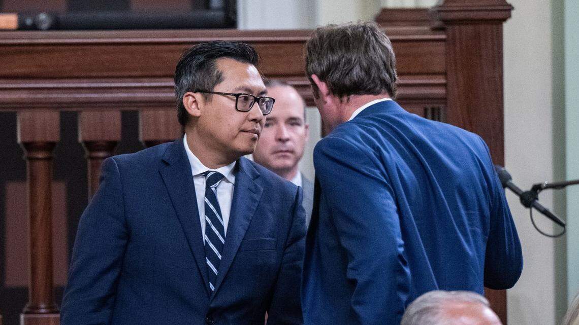 Assemblyman Vince Fong, R-Bakersfield, talks with Minority Leader James Gallagher, R-Yuba City, during an Assembly session in March. Fong filed to run for the seat of retiring Rep. Kevin McCarthy in California’s 20th Congressional District, but the secretary of state ruled Friday he may not legally run.