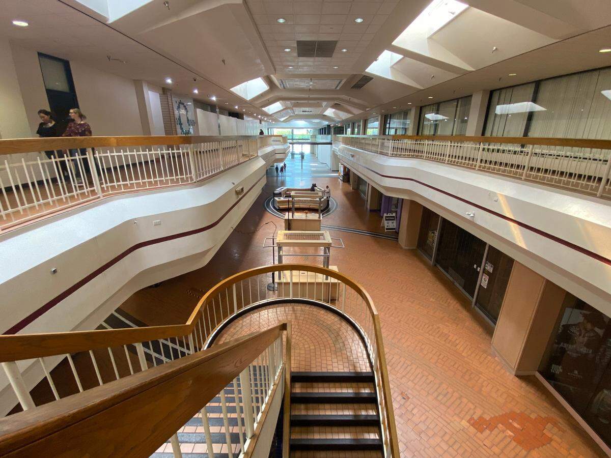 The sparsely populated inside of the Manchester Mall in Fresno from upstairs on Tuesday, Oct. 17, 2023.