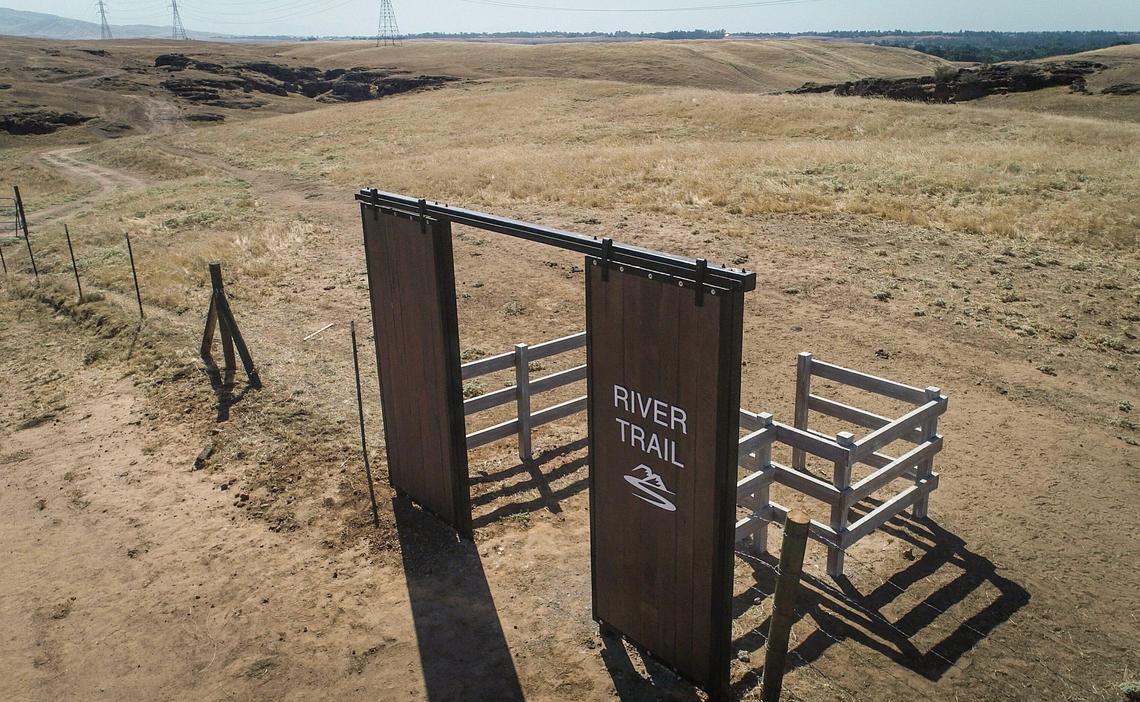 From the Kissing Gate on the southeastern corner of Tesoro Viejo, a 1,600-acre development in Madera County, a 0.7-mile dirt road leads to the San Joaquin River. The road will eventually become a paved multipurpose trail.