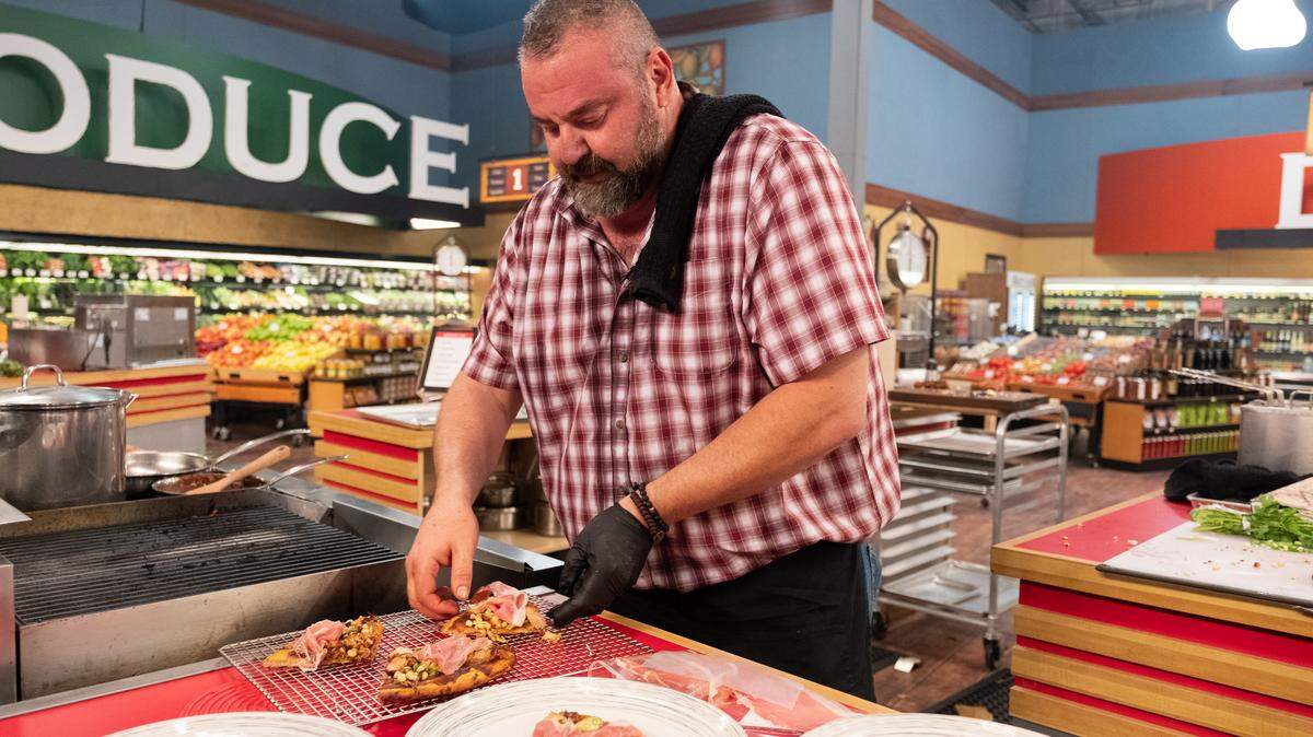 Contestant Vatche Moukhtarian of Cracked Pepper Bistro in Fresno plates his dish on “Guy’s Grocery Games” season 20 on the Food Network.