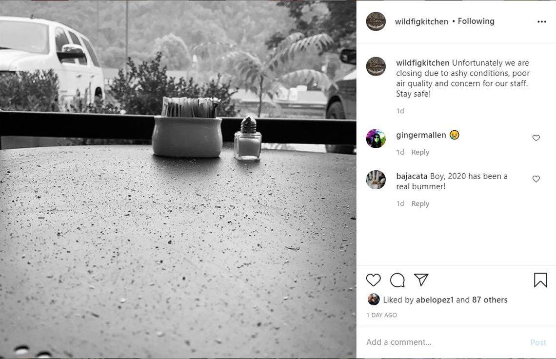 With a coating of ash on its outdoor tables, Wild Fig Kitchen in Coarsegold decided to close during its busiest day of the week, Sunday, because of the Creek Fire. The restaurant posted this image on its Instagram account.