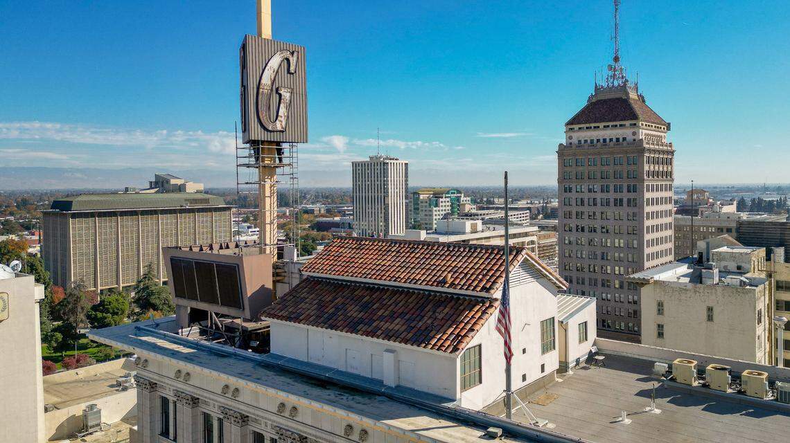 The G sign stands atop the Guarantee Savings Building in downtown Fresno on Tuesday, Nov. 28, 2023. The building was built in the 1920’s and is currently owned by the State Center Community College District. The SCCCD recently approved a project to replace the sign with a replica.