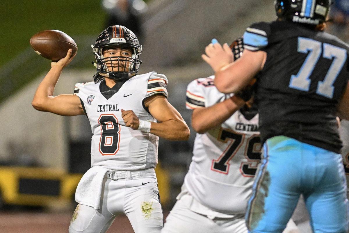 Central quarterback David Marquez throws against the Clovis North defense during their their Tri-River Athletic Conference football final at Veterans Memorial Stadium on Thursday, Oct. 26, 2023.