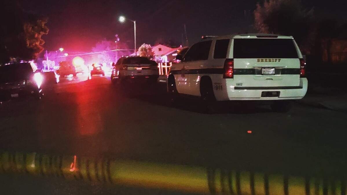 Sheriff’s deputies arrive at a fatal shooting Tuesday night in San Joaquin.