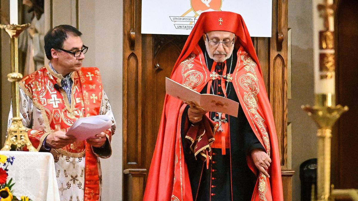 His Beatitude Raphael Bedros XXI Minassian, Catholicos-Patriarch of Cilicia of the Armenian Catholics, right, leads a prayer service at St. John’s Cathedral in Fresno on Monday, May 30, 2022.